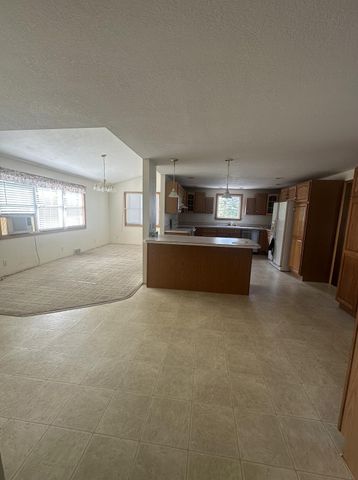 7360 S Tripp, Osseo, MI 49266