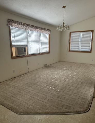 7360 S Tripp, Osseo, MI 49266
