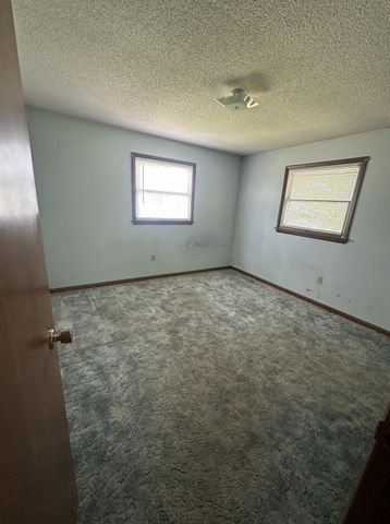 7360 S Tripp, Osseo, MI 49266