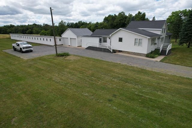 7360 S Tripp, Osseo, MI 49266