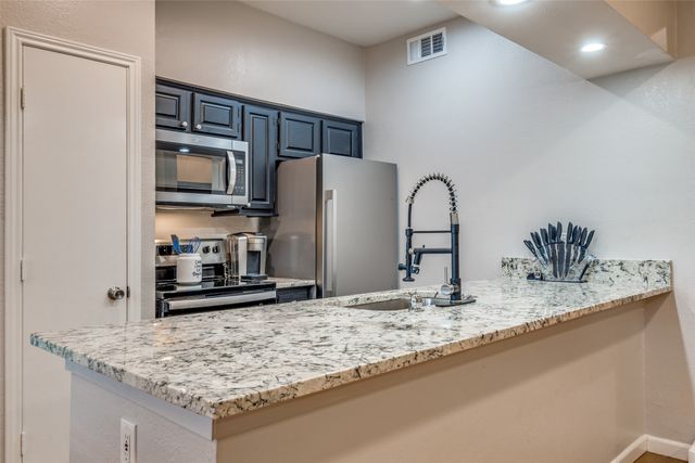 7525 Holly Hill Drive 1, Dallas, TX 75231