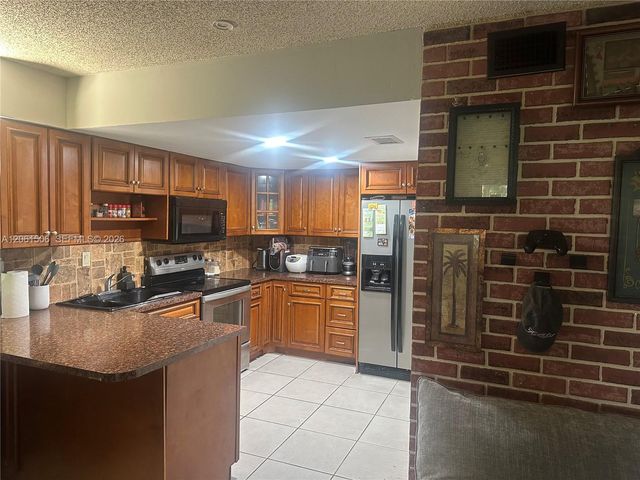 62 Spinning Wheel Lane, Tamarac, FL 33319