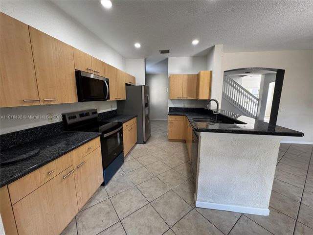 1007 Bamboo Ln, Weston, FL 33327