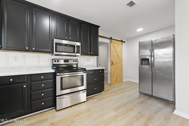 416 Shadowlawn Court, D'iberville, MS 39540