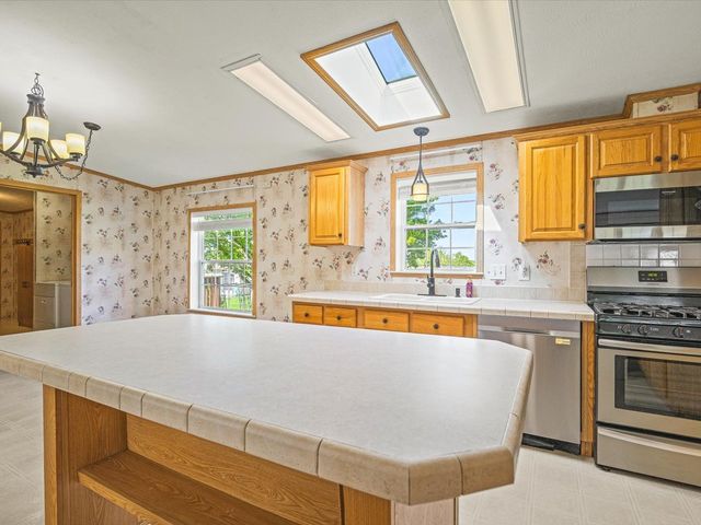 8438 HICKORY TREE Drive, Machesney Park, IL 61115