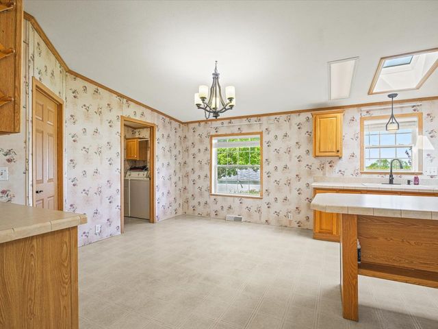 8438 HICKORY TREE Drive, Machesney Park, IL 61115