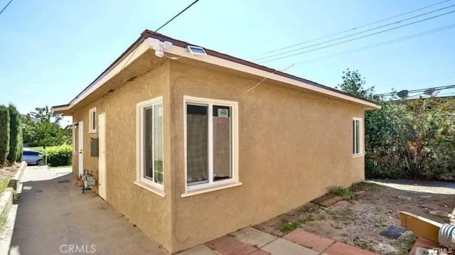 1877 S Cloverdale, Los Angeles, CA 90019