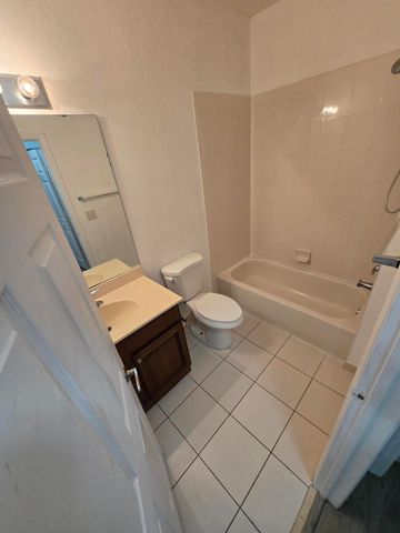 999 Pipers Cay Drive, West Palm Beach, FL 33415