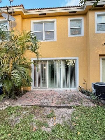 999 Pipers Cay Drive, West Palm Beach, FL 33415