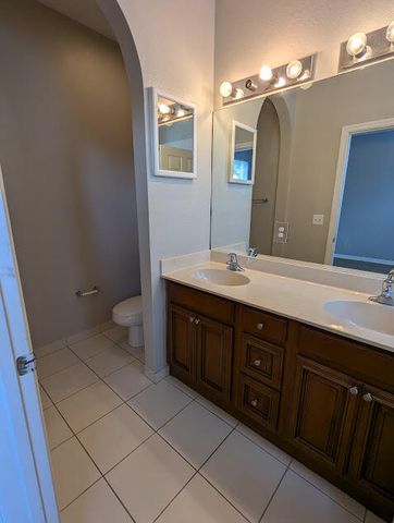 999 Pipers Cay Drive, West Palm Beach, FL 33415