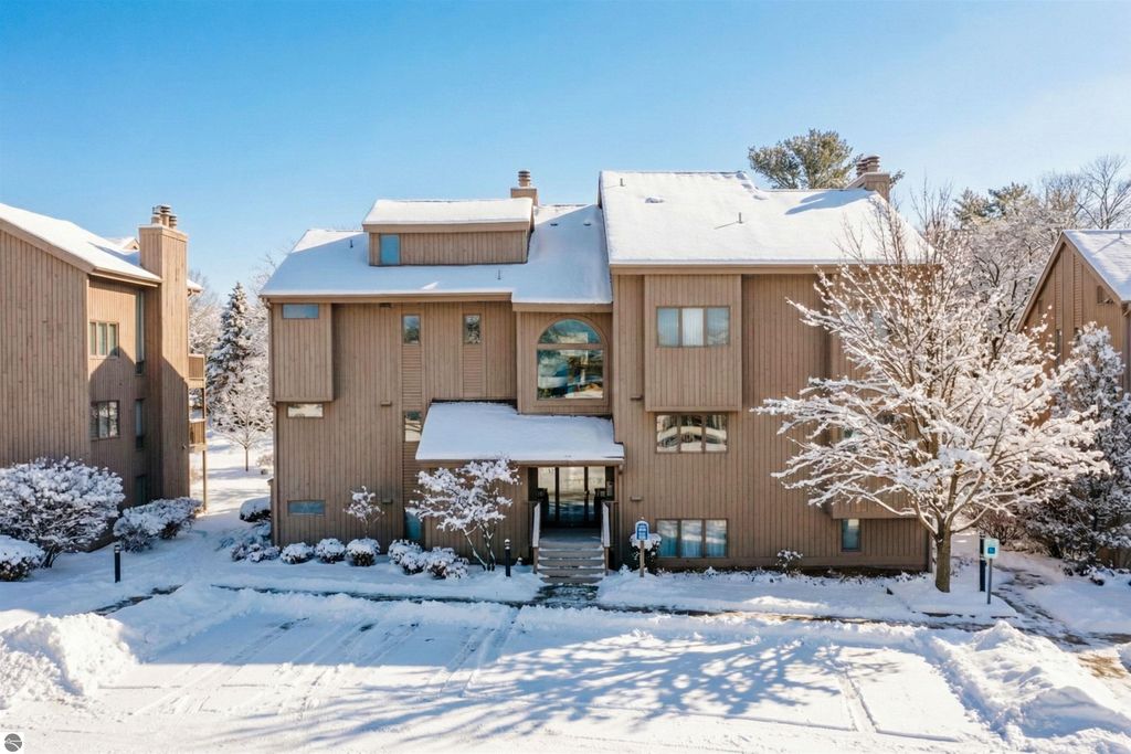 Image 1 of property listing at 5558 Golfview Court, Williamsburg, MI 49690