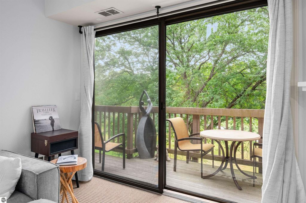 Image 12 of property listing at 5558 Golfview Court, Williamsburg, MI 49690