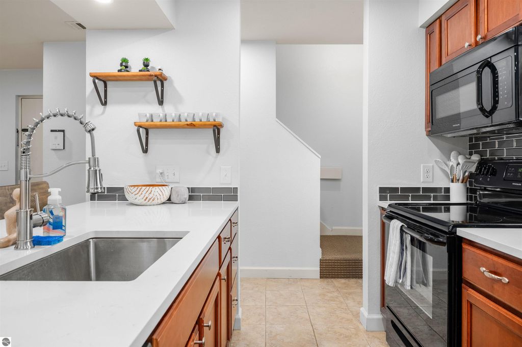 Image 18 of property listing at 5558 Golfview Court, Williamsburg, MI 49690