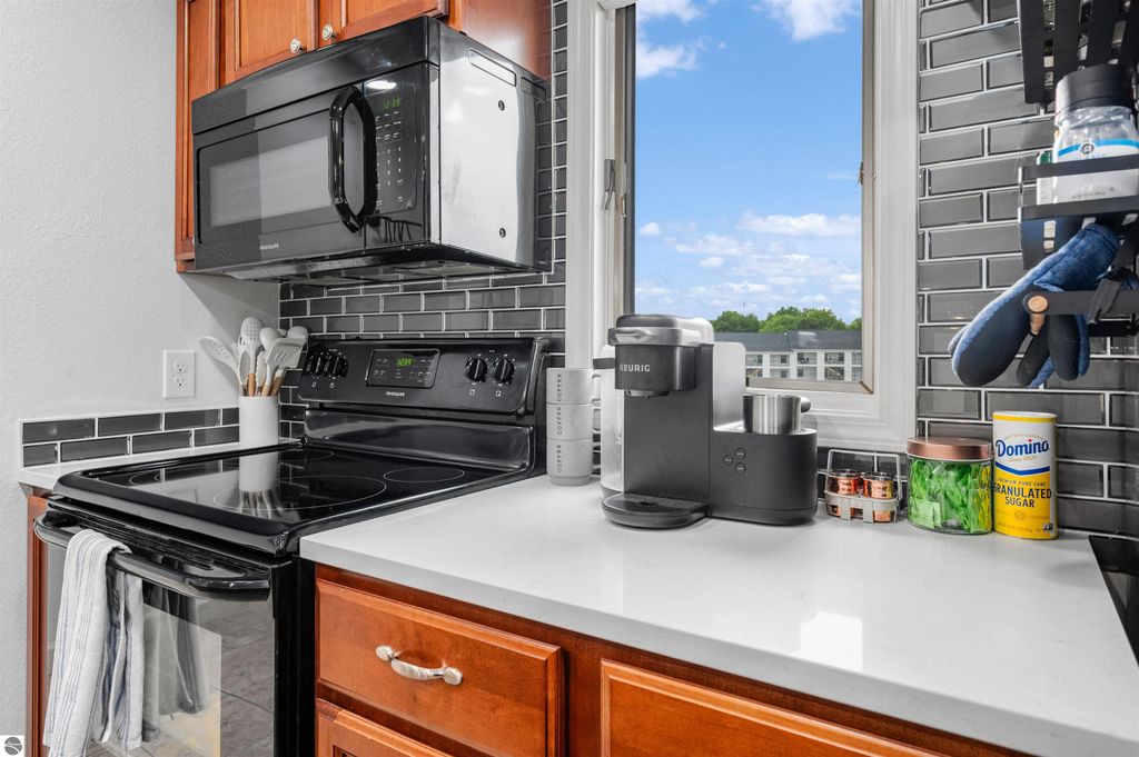 Image 20 of property listing at 5558 Golfview Court, Williamsburg, MI 49690