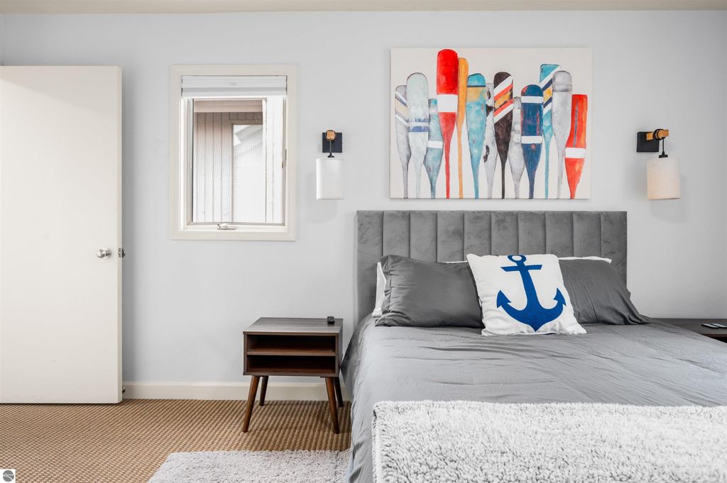 Image 23 of property listing at 5558 Golfview Court, Williamsburg, MI 49690