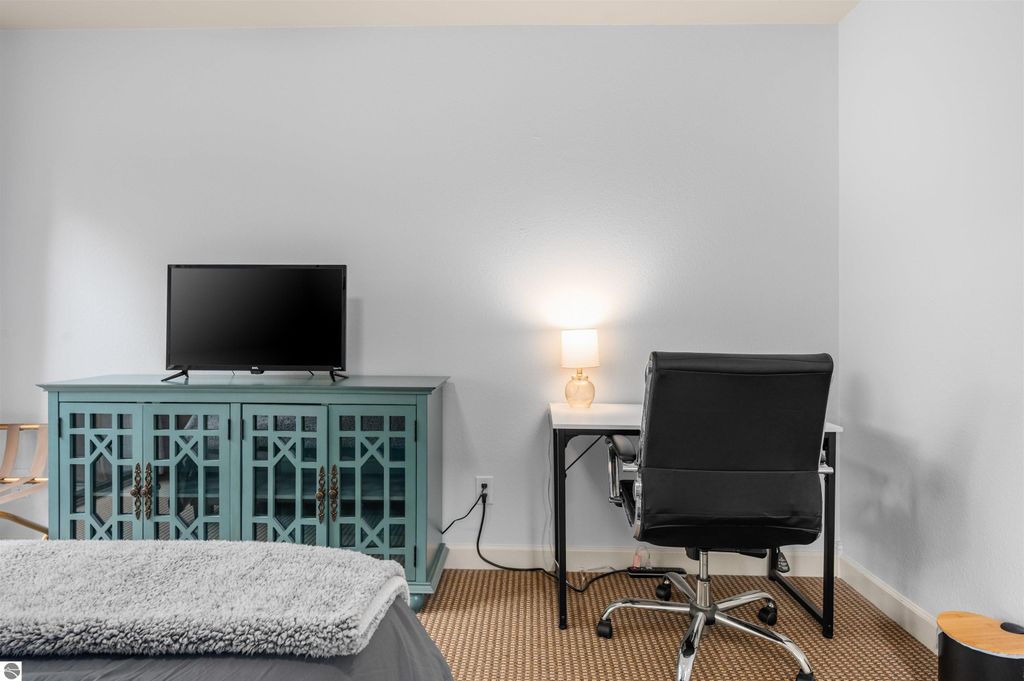 Image 24 of property listing at 5558 Golfview Court, Williamsburg, MI 49690