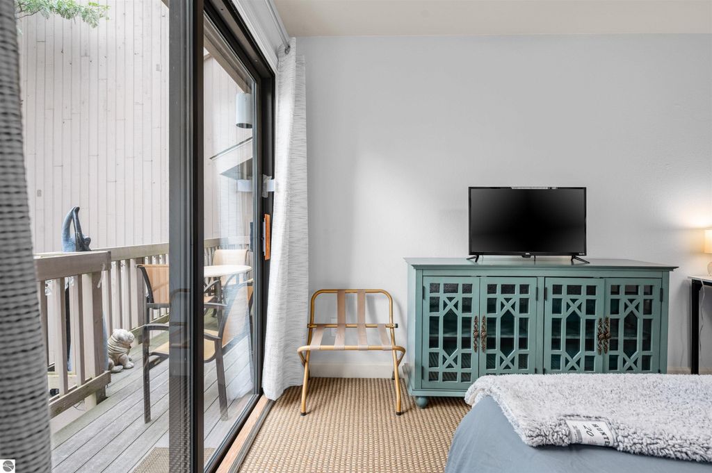 Image 27 of property listing at 5558 Golfview Court, Williamsburg, MI 49690