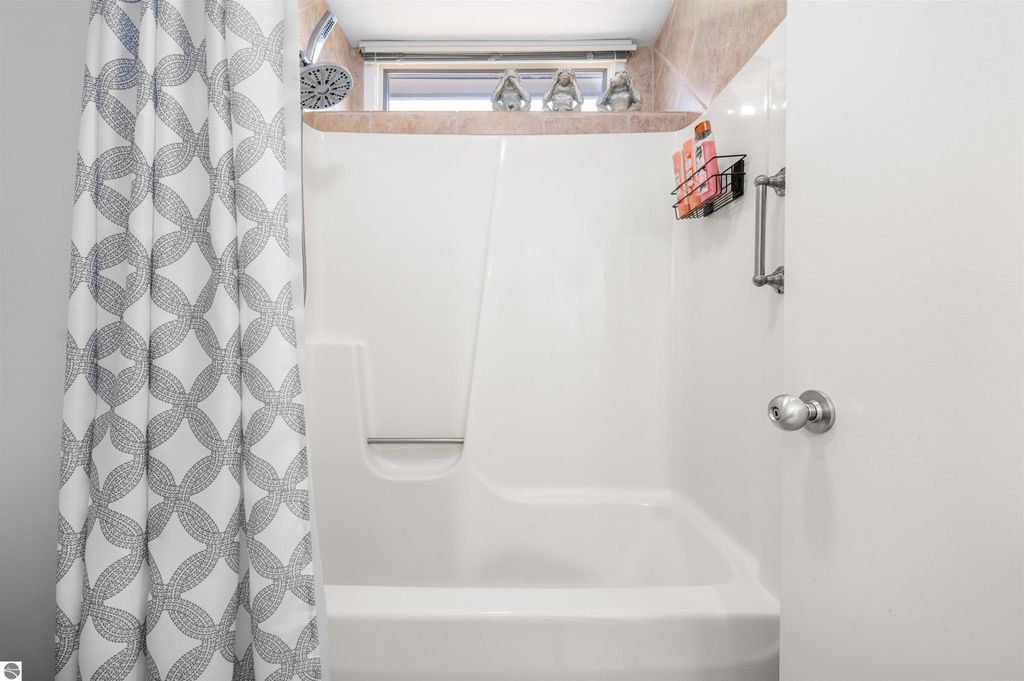 Image 28 of property listing at 5558 Golfview Court, Williamsburg, MI 49690