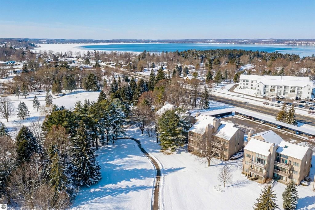 Image 3 of property listing at 5558 Golfview Court, Williamsburg, MI 49690