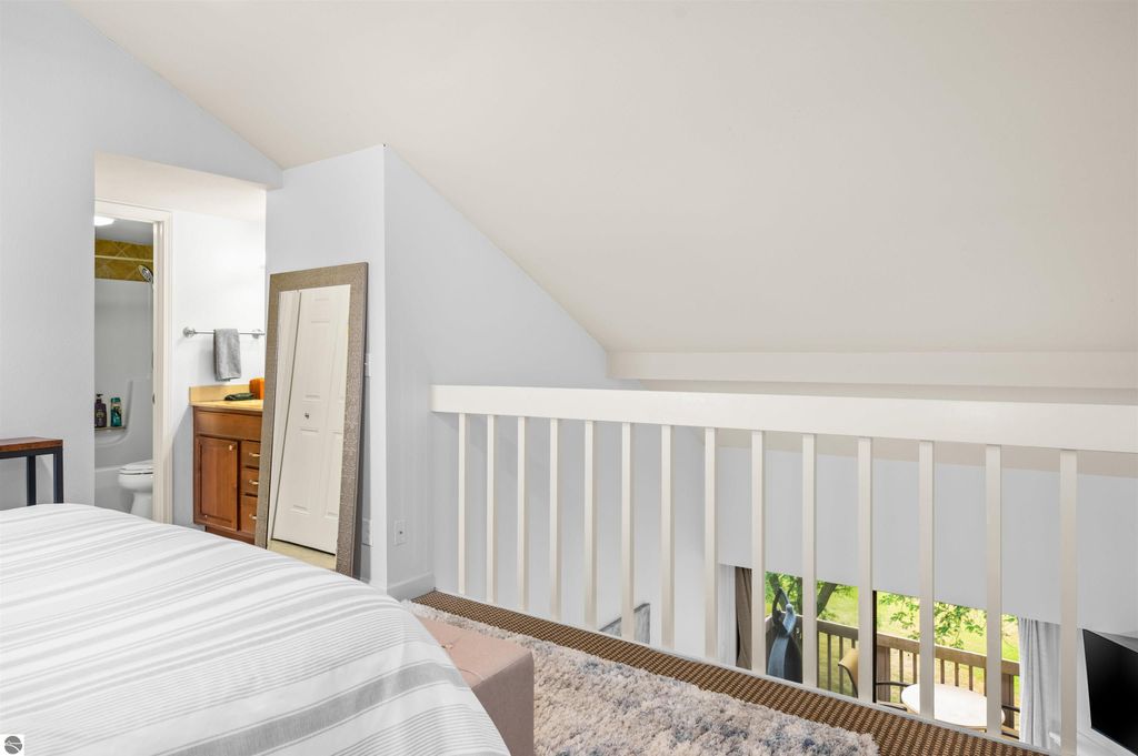 Image 33 of property listing at 5558 Golfview Court, Williamsburg, MI 49690