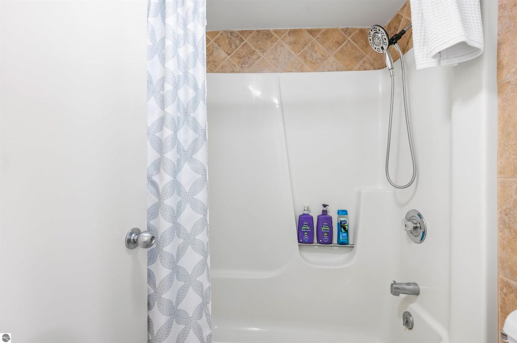 Image 35 of property listing at 5558 Golfview Court, Williamsburg, MI 49690