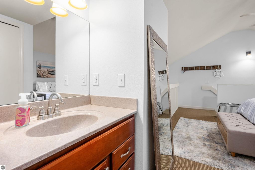 Image 36 of property listing at 5558 Golfview Court, Williamsburg, MI 49690