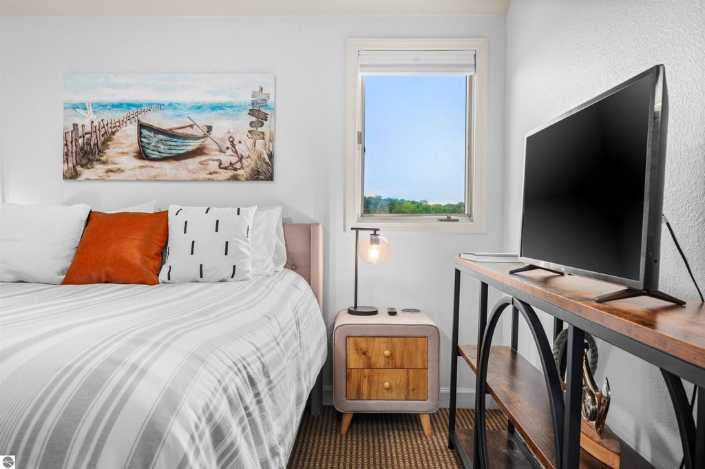 Image 37 of property listing at 5558 Golfview Court, Williamsburg, MI 49690