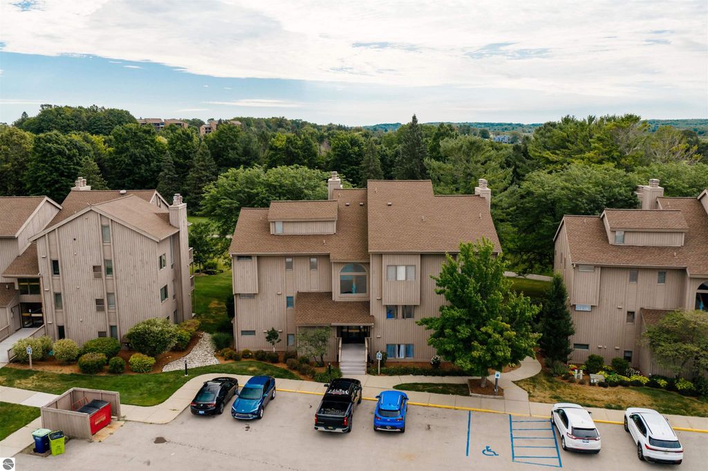 Image 38 of property listing at 5558 Golfview Court, Williamsburg, MI 49690