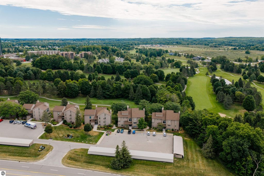 Image 42 of property listing at 5558 Golfview Court, Williamsburg, MI 49690