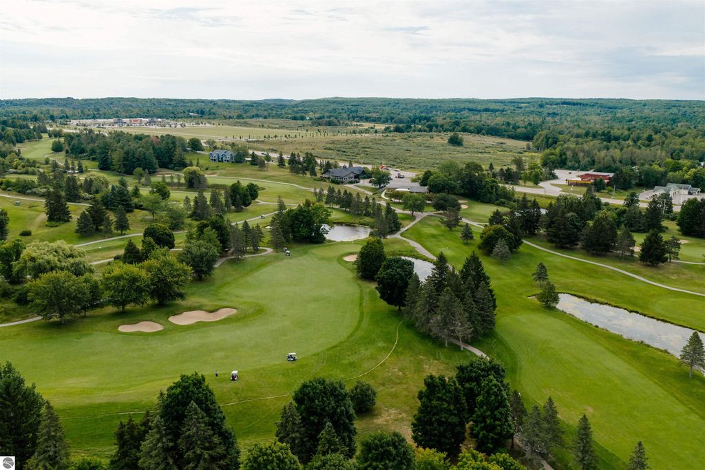 Image 46 of property listing at 5558 Golfview Court, Williamsburg, MI 49690