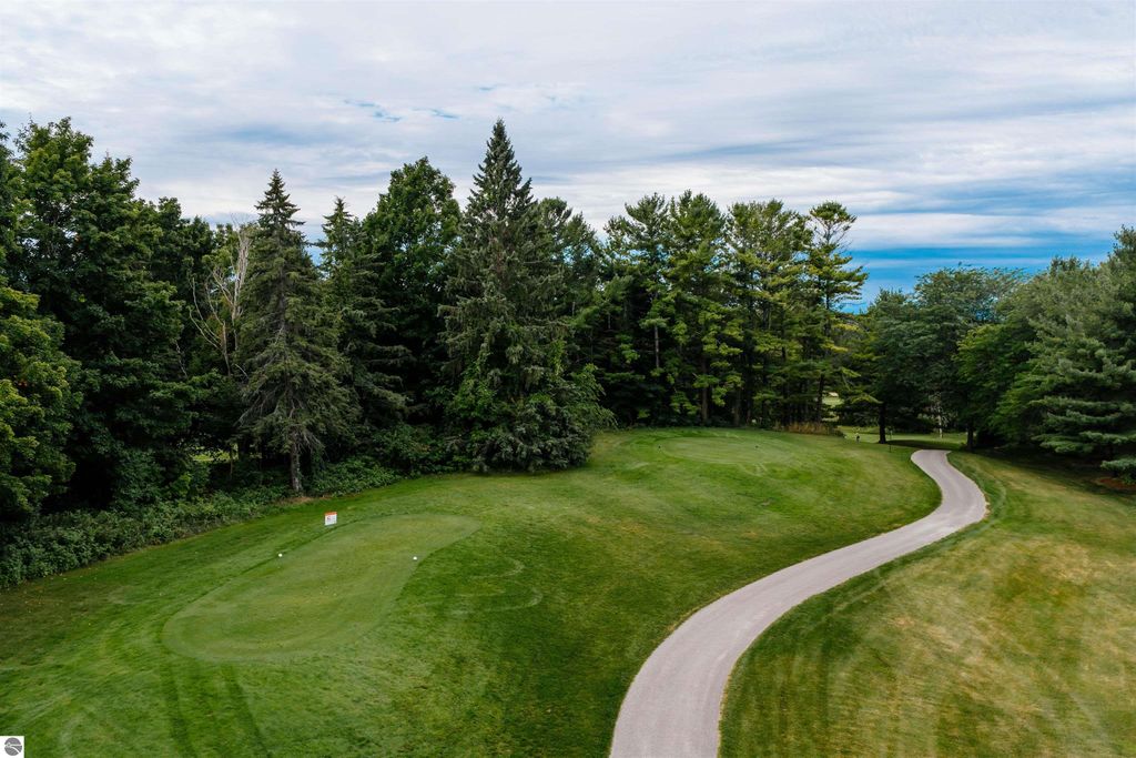 Image 50 of property listing at 5558 Golfview Court, Williamsburg, MI 49690