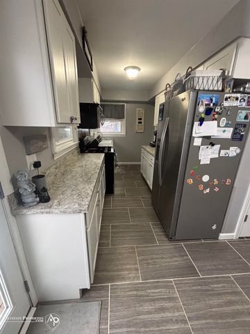 1327 Moores River Drive, Lansing, MI 48910