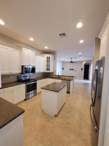 9335 Plantation Estates Drive, West Palm Beach, FL 33411