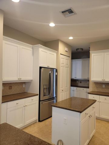 9335 Plantation Estates Drive, West Palm Beach, FL 33411