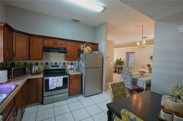 11702 CUXHAM DRIVE, Orlando, FL 32837