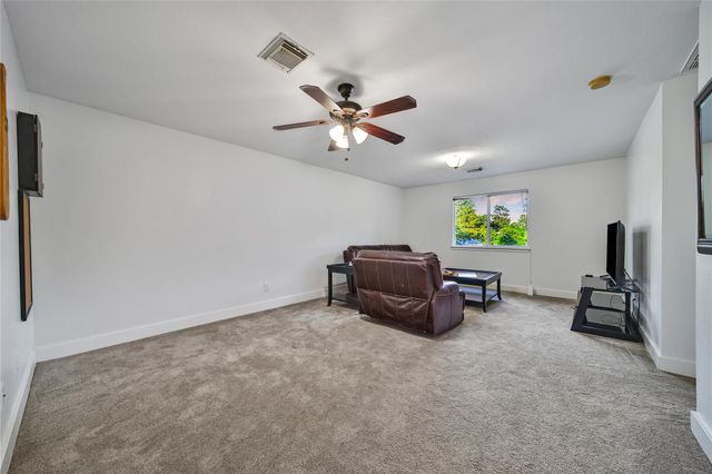 26897 Kings Park Hollow Drive, Kingwood, TX 77339