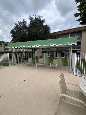700 VILLAGE GREEN Court 221, Palm Springs, FL 33461