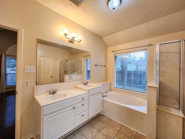 7 Wild Orchid Court, Conroe, TX 77385