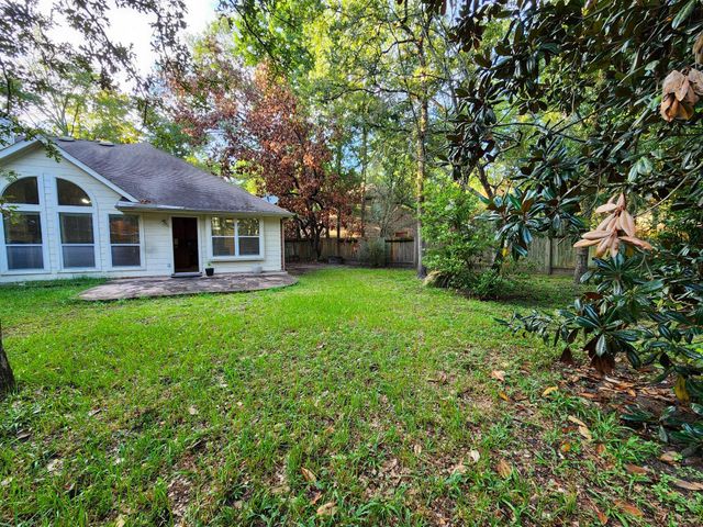 7 Wild Orchid Court, Conroe, TX 77385