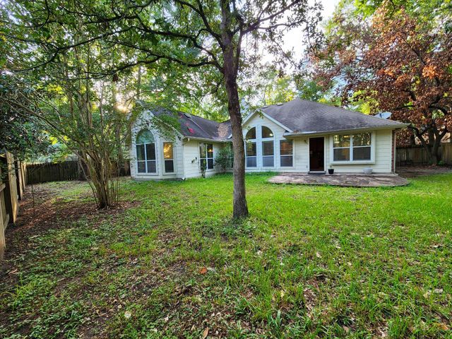 7 Wild Orchid Court, Conroe, TX 77385