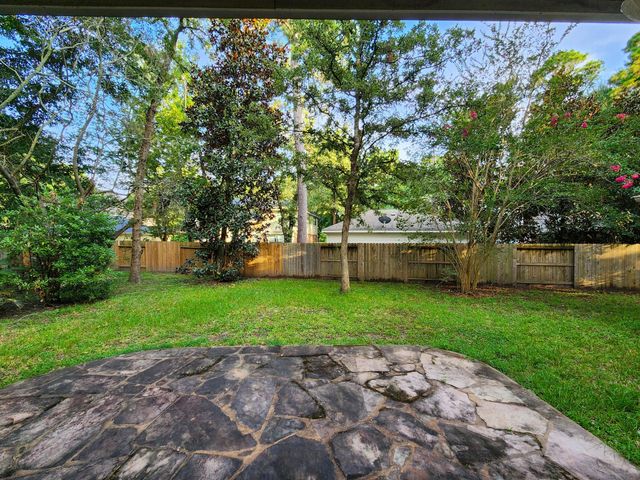 7 Wild Orchid Court, Conroe, TX 77385