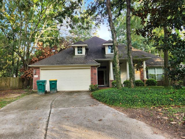 7 Wild Orchid Court, Conroe, TX 77385