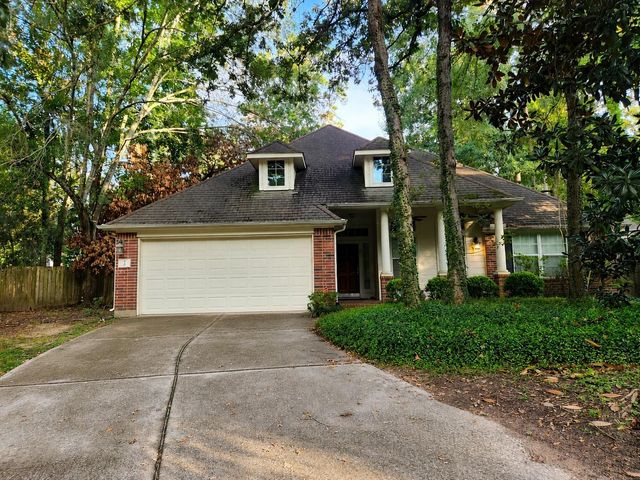 7 Wild Orchid Court, Conroe, TX 77385