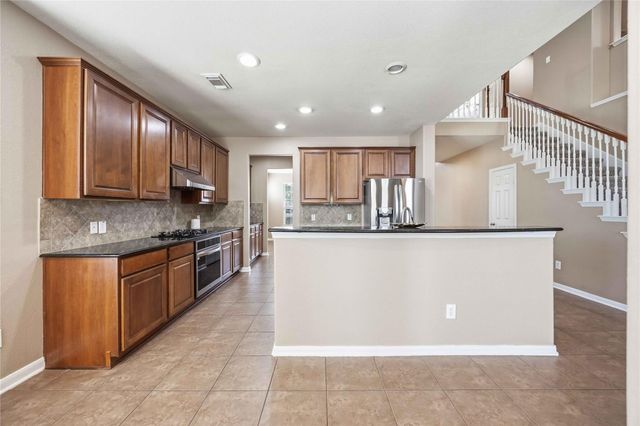 25302 Powerline Pass Drive, Spring, TX 77373