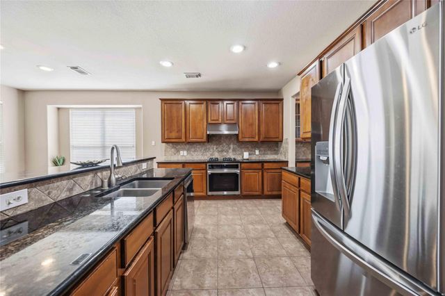 25302 Powerline Pass Drive, Spring, TX 77373