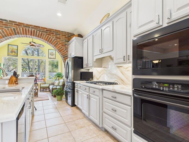 1706 Bronze Sunset Court, Houston, TX 77345