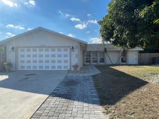 1107 Woodcrest Road W, West Palm Beach, FL 33417