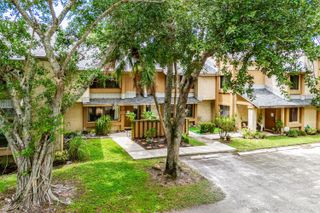 209 Wimbledon Lakes Drive, Plantation, FL 33324