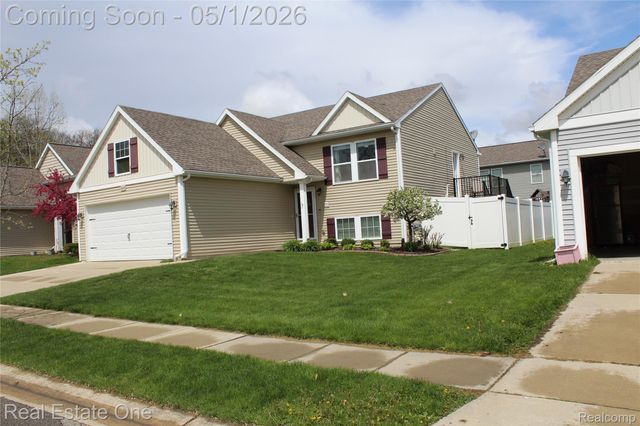 8662 Pinnebog River Drive, Handy Township, MI 48836