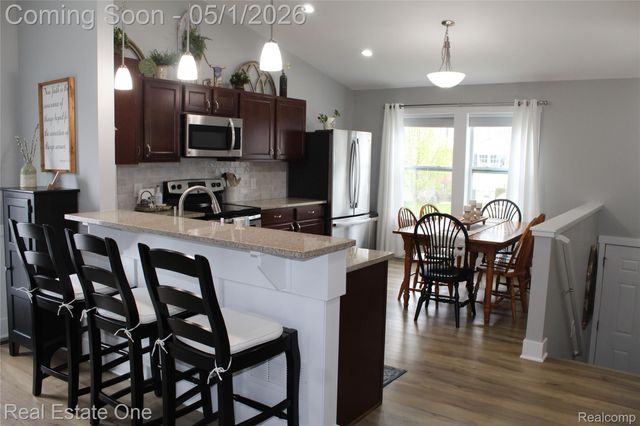 8662 Pinnebog River Drive, Handy Township, MI 48836